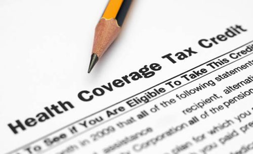close up of health coverage tax credit