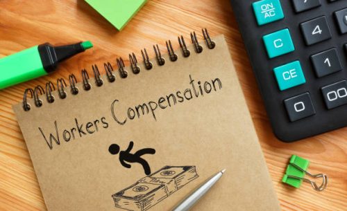 workers compensation is shown on a business photo using the text