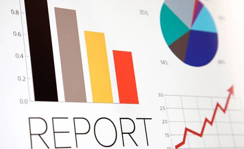 computer monitor with business graphics on it.