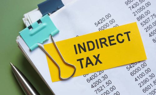 stack of papers with note about indirect tax.