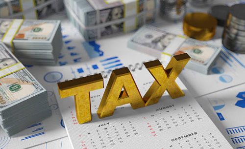 tax planning concept with calendar and dollar bills. 3d render.